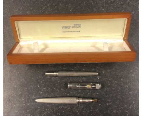 Montegrappa Ayrton Senna limited edition silver fountain pen, no. 1817/1960 with original silver body (dented), the cap with 