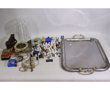 A quantity of ceramic and metal thimbles with a plastic thimble stand. Contains some silver content. Also includes a metal di