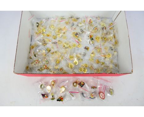 A quantity of Rupert The Bear related enamel pin badges, predominantly individually bagged. [W].