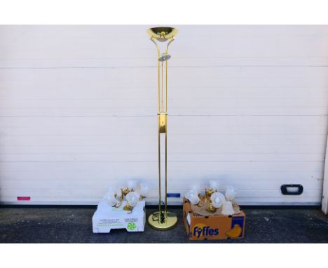 A contemporary brass tone standard lamp, approximately 185 cm (h) and a pair of five branch ceiling lights with opaque glass 