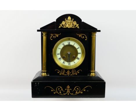 A 19th century black slate mantel clock of architectural form, Roman numerals to a white chapter ring, A D Mougin signed move