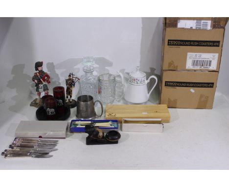 Mixed lot of glassware, ceramics, resin figures, coasters, and similar. Lot includes 3 x boxed stainless steel knife sets. A 