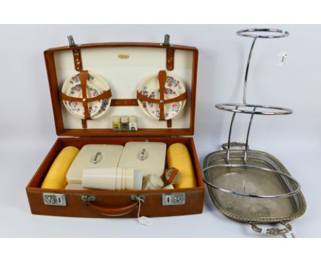 A vintage Sirram picnic set, cake stand and plated tray. [3]. [W]