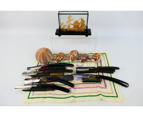 A quantity of vintage straight razors in part boxes, Chinese cork diorama, shells and other. [W]