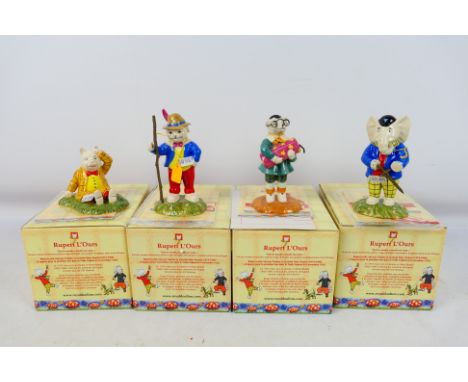 Royal Doulton - Four boxed Rupert The Bear figures / groups comprising Edward Trunk Pretending To Be An Outlaw, Bingo's Huge 