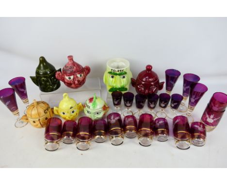 A collection of vintage novelty kitchen storage jars by Price Kensington (P&K) and a quantity of decorative glasses. [2]. [W]