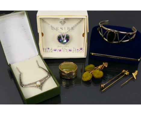 An attractive white metal stone set pendant and white metal chain, contained in Desire London jewellery box, a silver marcasi