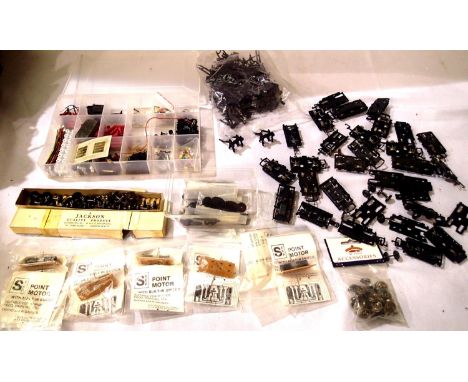 Selection of coach bogies/wheels, bag of buffer stops, six seep point motors, box of Jackson wagon wheels and other spares/pa