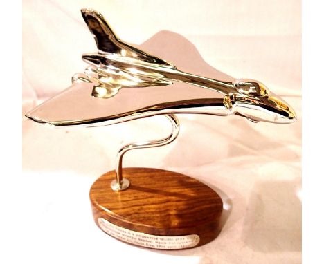 Chrome Vulcan Bomber on wooden base, W: 19 cm. P&amp;P Group 1 (£14+VAT for the first lot and £1+VAT for subsequent lots) 