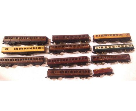 Ten N Gauge coaches, requires attention, suitable for spares or repair and one wagon. P&amp;P Group 2 (£18+VAT for the first 
