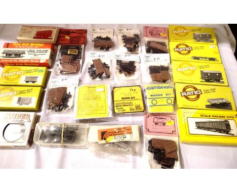 Twenty four assorted OO scale wagon kits, Ratio, Ian Kirk, Cambrian, Parkside etc, appear complete, contents unchecked. P&amp