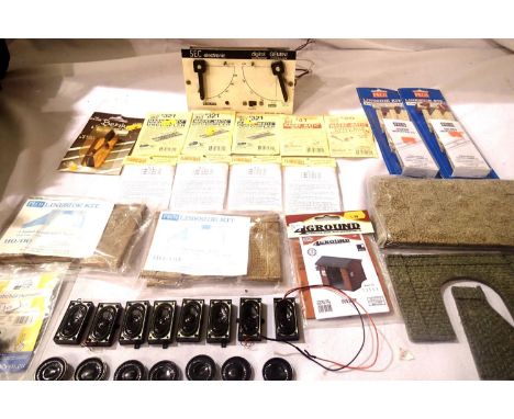 Selection of OO gauge accessories including Gemini controller, Peco kits, flush glaze kits, speakers, wagon loads, uncouplers