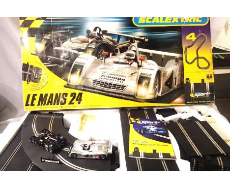 Scalextric Sport Le Mans 24 set, appears complete, good condition. P&amp;P Group 3 (£25+VAT for the first lot and £5+VAT for 