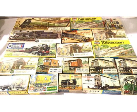 Nineteen Airfix OO scale railway related plastic kits, locomotives, wagons, accessories, appear complete, contents unchecked.