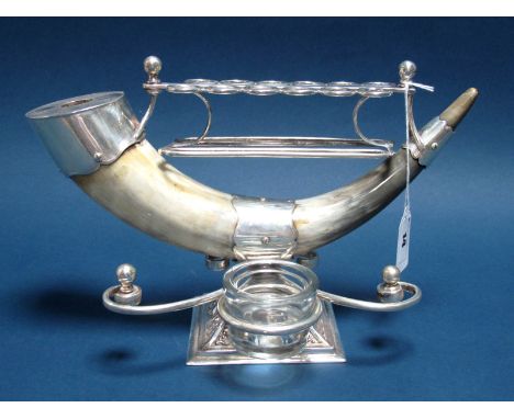 A Plated Mounted Horn Pipe Stand, fitted for twelve pipes, with associated glass candle holder, raised on spreading square ba