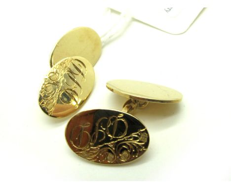 A Pair of 9ct Gold Gent's Cufflinks, the oval panels on chain connections, one plain and one engraved and initialled "DSD".