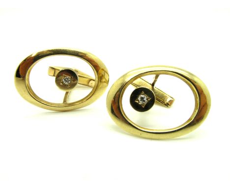 A Pair of Stylish 1970's 9ct Gold Diamond Set Gent's Cufflinks, each of oval openwork design, with brilliant cut diamond set 