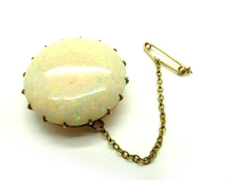 Louis Suhard &amp; Co (Adelaide); A Large Single Stone Opal Brooch, the (26mm diameter) circular opal claw set, the mount sta