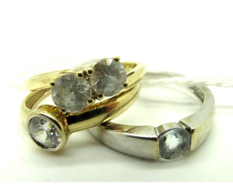 A 9ct Gold Dress Ring, collet rubover set to the centre; Together with Another 9ct Gold Dress Ring, and another. (3) 