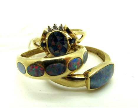 A Modern 9ct Gold QVC Opal Set Ring, rubover set; Together with Another Ring Similar, and a modern 9ct gold cluster ring, col