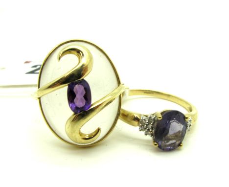 A Modern 9ct Gold QVC Dress Ring, oval cabochon collet set to the centre; Together with A 9ct Gold Stone Set Ring, claw set. 