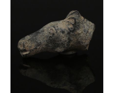 ITEM: Horse headMATERIAL: BronzeCULTURE: Greek, Archaic periodPERIOD: 7th - 6th Century B.CDIMENSIONS: 23 mm x 38 mm x 11 mmC