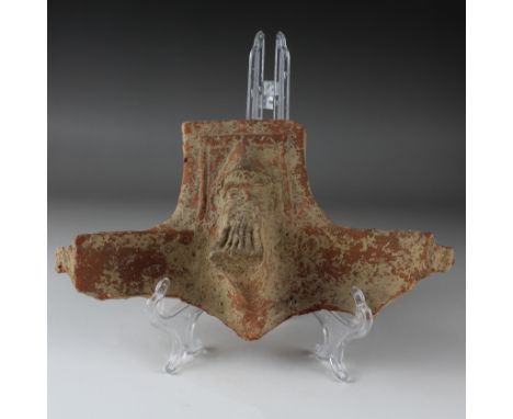 ITEM: Brazier fragment with Odysseus maskMATERIAL: PotteryCULTURE: Greek, HellenisticPERIOD: 3rd - 1st Century B.CDIMENSIONS: