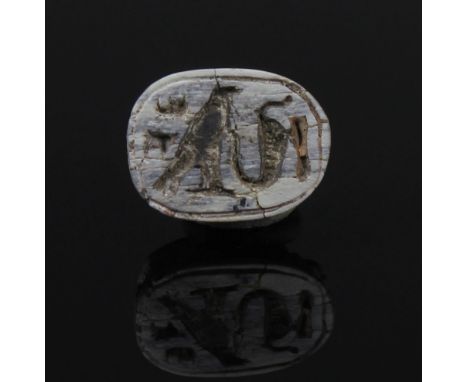 ITEM: Scarab with falcon, uraeus, men-sign (Amun-Re)MATERIAL: SteatiteCULTURE: EgyptianPERIOD: New Kingdom, 1550 - 1070 B.CDI