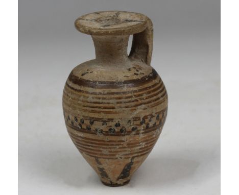 ITEM: Piriform aryballosMATERIAL: PotteryCULTURE: Greek, Proto-CorinthianPERIOD: 7th – 6th Century B.CDIMENSIONS: 65 mm x 40 