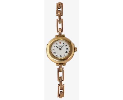 A 9ct gold lady's manual wind half hunter bracelet wristwatchthe enamel dial with Roman numerals and dot minute track, with e