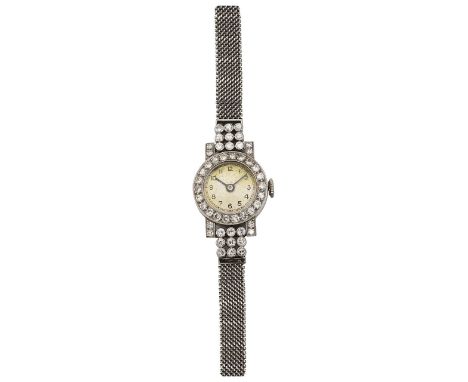 A lady's diamond set evening wristwatchround dial with Arabic numerals, blue steeled hands, manual wind movement, case set wi