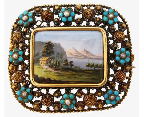 A 19th Century continental panel brooch set with a central enamel panel painted with an Alpine scene, within an open-work bor