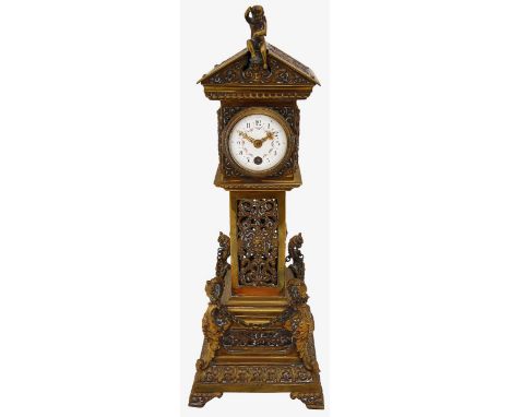 A late 19th century French novelty brass mantel timepiece in the form of a longcase clockcircular white enamel dial with blac