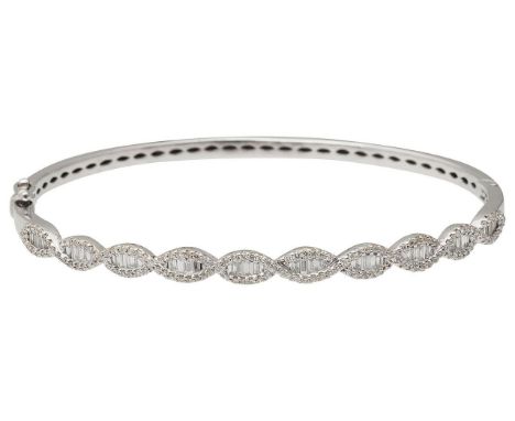 An 18ct white gold and diamond set hinge banglefeaturing round brilliant-cut and rectangular-cut diamonds, set to a 18ct whit