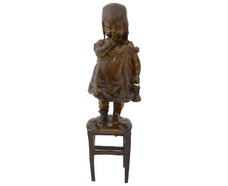 Juan Clara. (Spanish, 1875-1958) A patinated bronze of a young girl standing on stoolsigned Juan Clara, bears Goldscheider fo