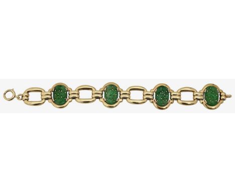A jade panel braceletfour carved jade panels depicting birds, set to a yellow metal mount, stamped indistinctly to clasp 14Kt