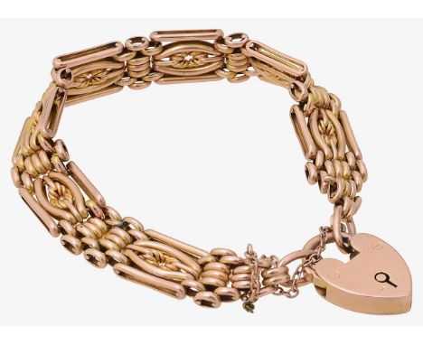 An Edwardian fancy link gate bracelet stamped "9c" to link, with heart padlock-clasp stamped "9ct" with safety chain total ap