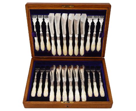 A late Victorian cased set of twelve mother of pearl handled electroplated fish knives and forks stamped Mappin &amp; Webb, c