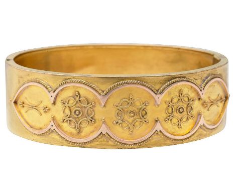Victorian gilt hinged bangle with applied design to one half, with case total approx. diameter 6cm, total approx. weight 26.3