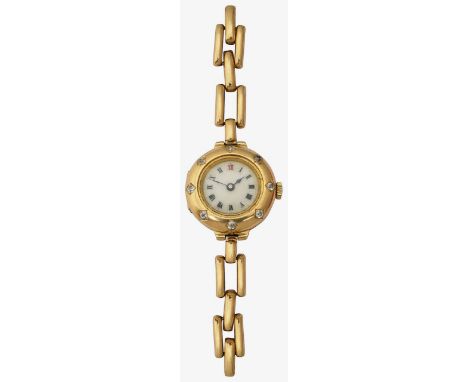 A lady's 18ct gold and diamond set wristwatchcircular white dial, with Roman numerals and gilt dot outer minute marker, blue 
