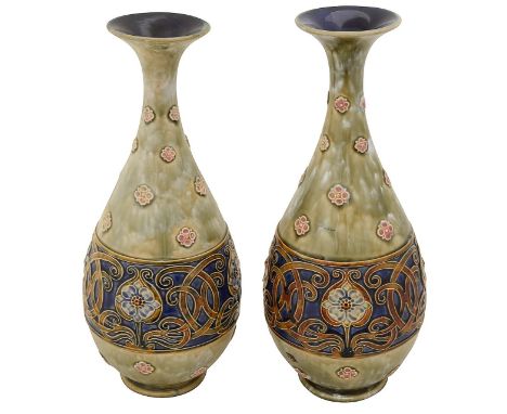 A pair of Royal Doulton Art Nouveau stoneware vases c.1900of baluster form with slender necks and flared rims, decorated with