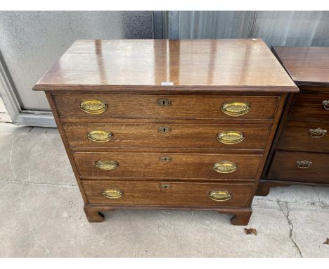 A GEORGE III OAK CHEST OF FOUR GRADUATED DRAWERS ON BRACKET FEET, THE SIDES BEING PINE, 34" WIDE, 32" HIGH 