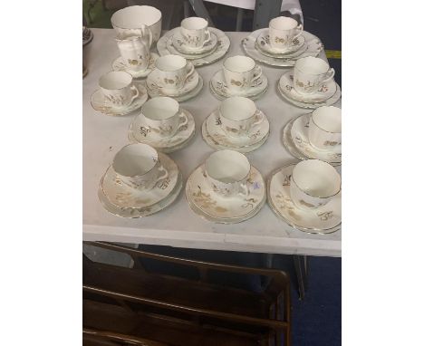 A LARGE TEA SERVICE SET TO INCLUDE ELEVEN TRIOS ETC 