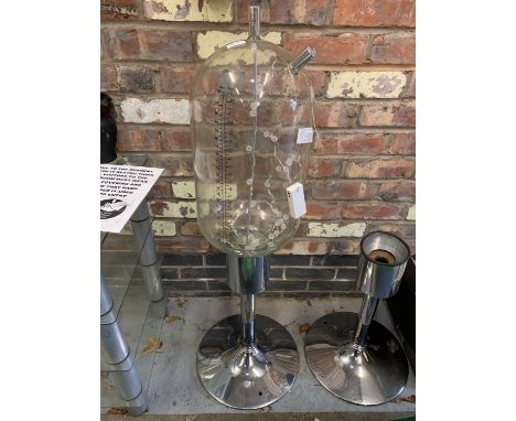A UNIQUE UPCYCLED LIGHT UTILISING AN AGRICULTURAL GLASS MILKING JAR 