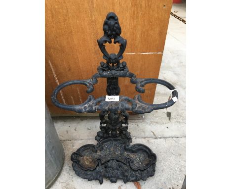 A HEAVY CAST IRON VINTAGE STICK STAND 