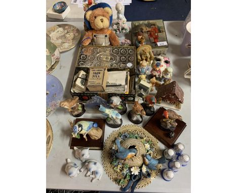 AN ASSORTMENT OF CERAMIC WARE TO INCLUDE BEAR FIGURES AND A TIN CONTAINING CHESS PIECES ETC 
