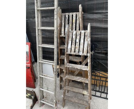 AN ALLOY LADDER AND TWO VINTAGE WOODEN STEP LADDERS 