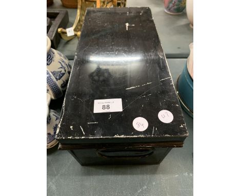 A VINTAGE BLACK TIN DEED BOX 