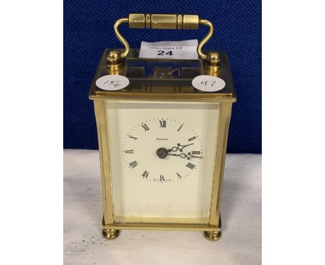 A VINTAGE BRASS CARRIAGE CLOCK WITH VISUAL MOVEMENTS 