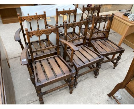 A SET OF SIX ERCOL DINING CHAIRS WITH TRIPLE ARCHED AND TURNED BACKS AND SLATTED SEATS (2 CHAIRS BEING CARVERS) 